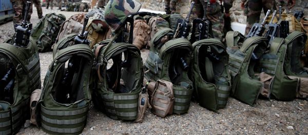 French soldiers prepare their equipment at the Satory military base, near Paris, as part of the highest level of Vigipirate security plan after last week's Islamic militants attacks January 13, 2015 - Sputnik International