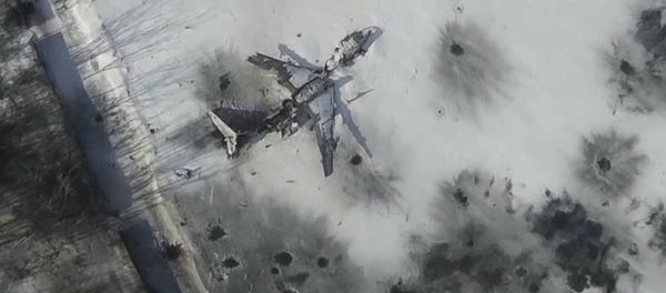 Airplane in the snow at the Sergey Prokofiev International Airport damaged by shelling during fighting Airplane in the snow at the Sergey Prokofiev International Airport damaged by shelling during fighting - Sputnik International