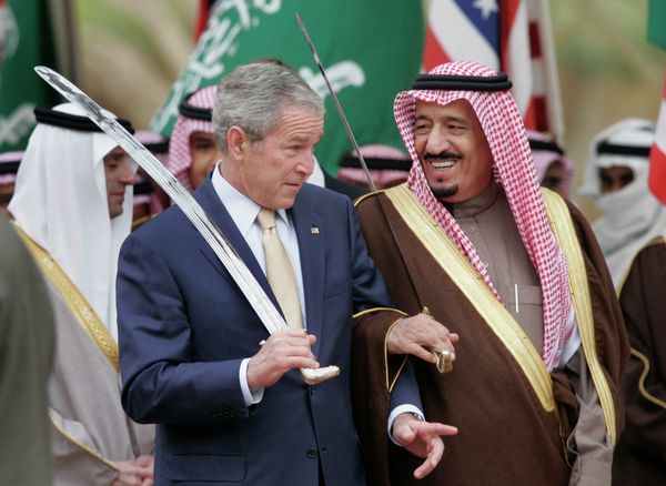 President Bush stands with Saudi Prince Salman, right, brother of Saudi King Abdullah, while watching a traditional sword dance at the Al Murabba Palace and Natural History Museum in Al Janadriyah, Saudi Arabia, Tuesday, Jan. 15, 2008 - Sputnik International