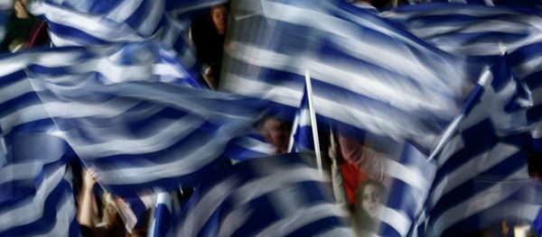 Supporters of Greece's Prime Minister Antonis Samaras wave Greek flags - Sputnik International