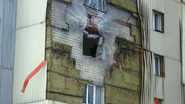 A residential building near Donetsk railway station damaged in the result of shelling by the Ukrainian army A residential building near Donetsk railway station damaged in the result of shelling by the Ukrainian army - Sputnik International