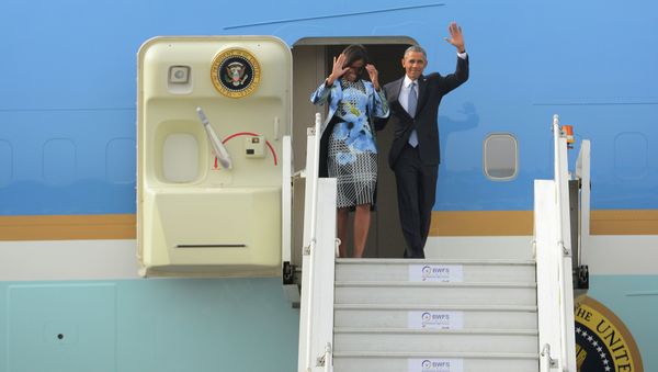 U.S. President Barack Obama and first lady Michelle Obama wave as they step out of Air Force One upon arrival at the Palam Air Force Station in New Delhi, India, Sunday, Jan. 25, 2015 U.S. President Barack Obama and first lady Michelle Obama wave as they step out of Air Force One upon arrival at the Palam Air Force Station in New Delhi, India, Sunday, Jan. 25, 2015 - Sputnik International