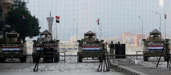 Armoured vehicles and barbed wire block an entrance to Tahrir Square during the 4th anniversary of the January 2011 uprising, in Cairo January 25, 2015 Armoured vehicles and barbed wire block an entrance to Tahrir Square during the 4th anniversary of the January 2011 uprising, in Cairo January 25, 2015 - Sputnik International