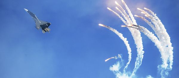 A Sukhoi 30 multi-purpose fighter jet of the Russian Falcons aerobatics team flies during an air show as part of the Air Force Contract Service is Your Choice - Sputnik International