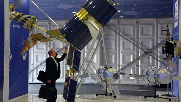 A Gonets-M satellite showcased at the Reshetnev Information Satellite Systems company's stand at the Farnborough International Airshow 2014 - Sputnik International