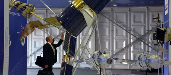A Gonets-M satellite showcased at the Reshetnev Information Satellite Systems company's stand at the Farnborough International Airshow 2014 A Gonets-M satellite showcased at the Reshetnev Information Satellite Systems company's stand at the Farnborough International Airshow 2014 - Sputnik International