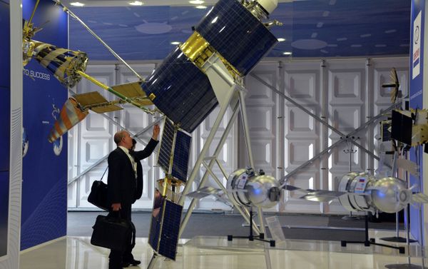 A Gonets-M satellite showcased at the Reshetnev Information Satellite Systems company's stand at the Farnborough International Airshow 2014 A Gonets-M satellite showcased at the Reshetnev Information Satellite Systems company's stand at the Farnborough International Airshow 2014 - Sputnik International