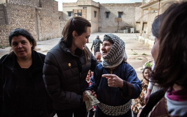 United Nations High Commissioner for Refugees (UNHCR) Special Envoy Angelina Jolie (2nd L) meets displaced Iraqis who are members of the minority Christian community, living in an abandoned school in Al Qosh, northern Iraq United Nations High Commissioner for Refugees (UNHCR) Special Envoy Angelina Jolie (2nd L) meets displaced Iraqis who are members of the minority Christian community, living in an abandoned school in Al Qosh, northern Iraq - Sputnik International
