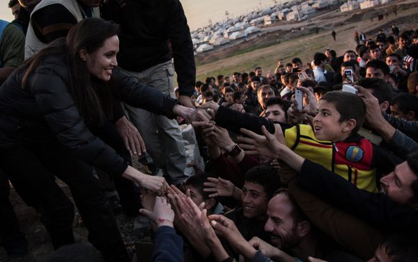 United Nations High Commissioner for Refugees (UNHCR) Special Envoy Angelina Jolie meets members of the Yazidi minority in Khanke internally displaced person (IDP) Camp in Dohuk, northern Iraq January 25, 2015. Jolie paid a visit to the Kurdish refugee camp in Dohuk, northern Iraq United Nations High Commissioner for Refugees (UNHCR) Special Envoy Angelina Jolie meets members of the Yazidi minority in Khanke internally displaced person (IDP) Camp in Dohuk, northern Iraq January 25, 2015. Jolie paid a visit to the Kurdish refugee camp in Dohuk, northern Iraq - Sputnik International