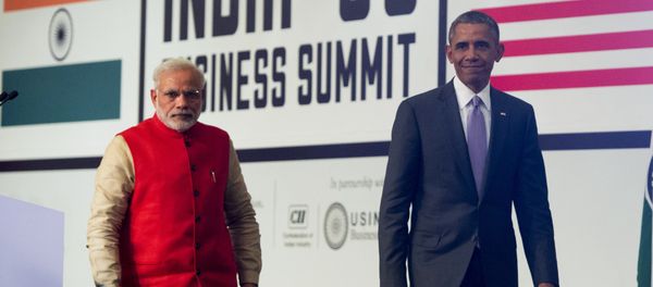 Indian Prime Minister Narendra Modi (L) and US President Barack Obama leave after speaking during the India-US Business Summit in New Delhi on January 26, 2015. - Sputnik International