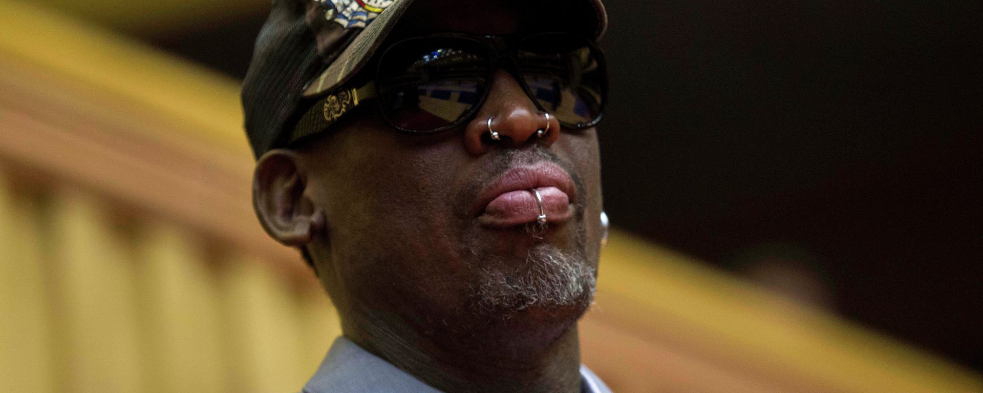 Dennis Rodman, looks out at the court at the end of an exhibition basketball game with U.S. and North Korean players at an indoor stadium in Pyongyang, North Korea Dennis Rodman, looks out at the court at the end of an exhibition basketball game with U.S. and North Korean players at an indoor stadium in Pyongyang, North Korea - Sputnik International, 1920, 21.08.2022