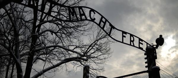 The central gate of the former Auschwitz-Birkenau concentration camp in Auschwitz The central gate of the former Auschwitz-Birkenau concentration camp in Auschwitz - Sputnik International