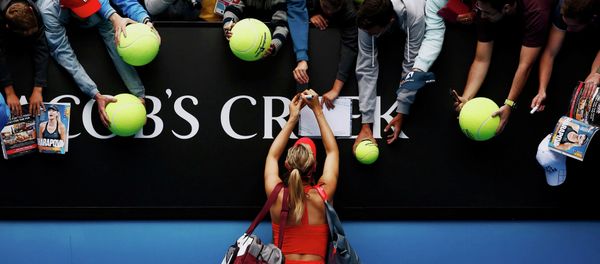 Maria Sharapova of Russia signs autographs after defeating Eugenie Bouchard of Canada in their women's singles quarter-final match at the Australian Open 2015 tennis tournament in Melbourne - Sputnik International