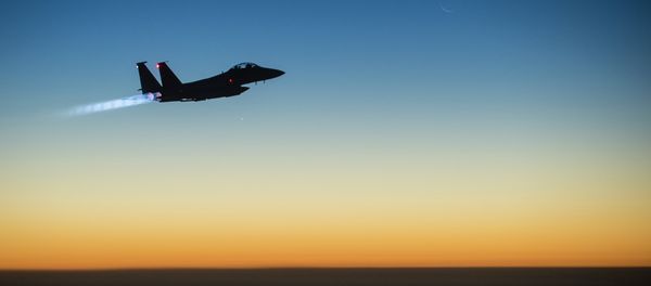 A US Air Force F-15E Strike Eagle aircraft flies over northern Iraq Sept. 23, 2014 A US Air Force F-15E Strike Eagle aircraft flies over northern Iraq Sept. 23, 2014 - Sputnik International