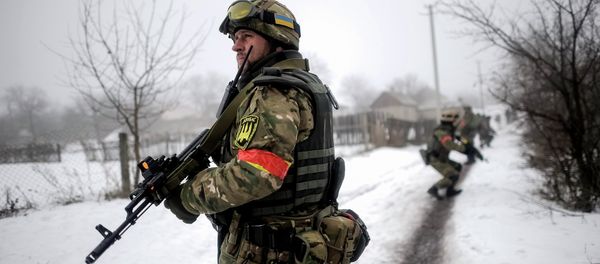 Ukrainian servicemen patrol Orekhovo village in Luhansk region January 28, 2015 Ukrainian servicemen patrol Orekhovo village in Luhansk region January 28, 2015 - Sputnik International