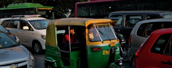 An Indian woman passenger looks at camera as she travels in an auto-rickshaw, a cheaper mode of three wheeler taxi service in New Delhi, India An Indian woman passenger looks at camera as she travels in an auto-rickshaw, a cheaper mode of three wheeler taxi service in New Delhi, India - Sputnik International