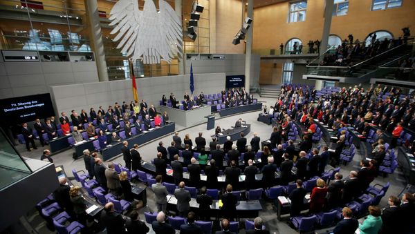 German Chancellor Angela Merkel, members of government and parliament observe a minute of silence to commemorate the victims of the attack at the Paris offices of French weekly satirical newspaper Charlie Hebdo - Sputnik International