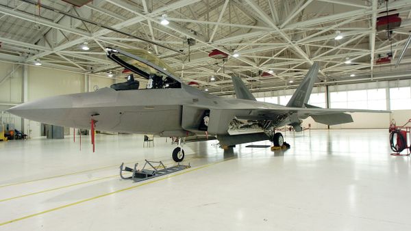 In this Aug. 7, 2008 file photo, a static display of a Lockheed Martin F-22 Raptor jet is seen at Langley Air Force Base in Hampton, Va. In this Aug. 7, 2008 file photo, a static display of a Lockheed Martin F-22 Raptor jet is seen at Langley Air Force Base in Hampton, Va. - Sputnik International