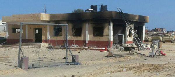 A damaged building is seen at a location where an attack took place on security forces in North Sinai, January 30, 2015 - Sputnik International