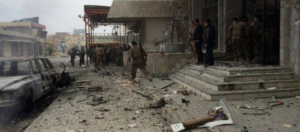 Kurdish peshmerga fighters secure a hotel near police headquarters in oil-rich Kirkuk, 290 kilometers (180 miles) north of Baghdad, Iraq, Friday, Jan. 30, 2015 Kurdish peshmerga fighters secure a hotel near police headquarters in oil-rich Kirkuk, 290 kilometers (180 miles) north of Baghdad, Iraq, Friday, Jan. 30, 2015 - Sputnik International