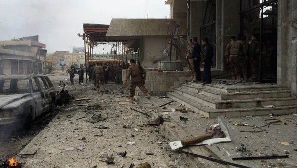 Kurdish peshmerga fighters secure a hotel near police headquarters in oil-rich Kirkuk, 290 kilometers (180 miles) north of Baghdad, Iraq, Friday, Jan. 30, 2015 Kurdish peshmerga fighters secure a hotel near police headquarters in oil-rich Kirkuk, 290 kilometers (180 miles) north of Baghdad, Iraq, Friday, Jan. 30, 2015 - Sputnik International