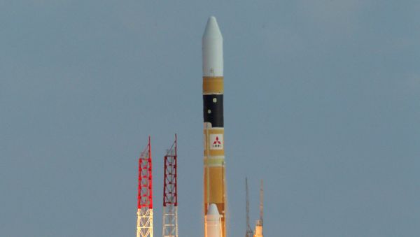 Japan's H-2A rocket, carrying a spy satellite, launches from the launch pad of Tanegashima Space Center at Tanegashima island in Kagoshima prefecture, Japan's southern island of Kyushu on February 1, 2015 - Sputnik International