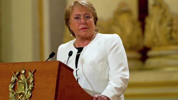 Chile's President Michelle Bachelet listens to Guatemala's President Otto Perez Molina during their joint press conference at the National Palace in Guatemala City, Friday, Jan. 30, 2015 - Sputnik International