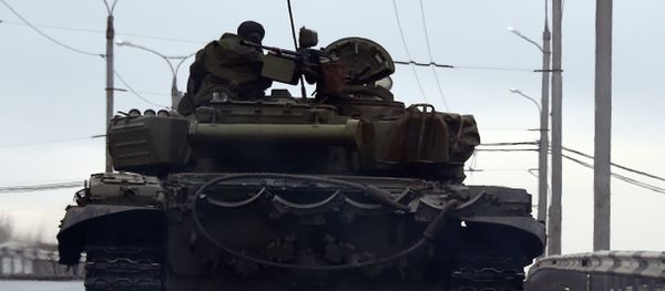 A tank drives in the center of the eastern city of Donetsk A tank drives in the center of the eastern city of Donetsk - Sputnik International