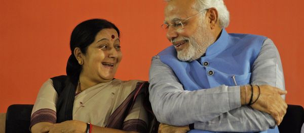 Prime Minister Narendra Modi, right, has a laugh with Sushma Swaraj, the country's new External Affairs Minister. - Sputnik International