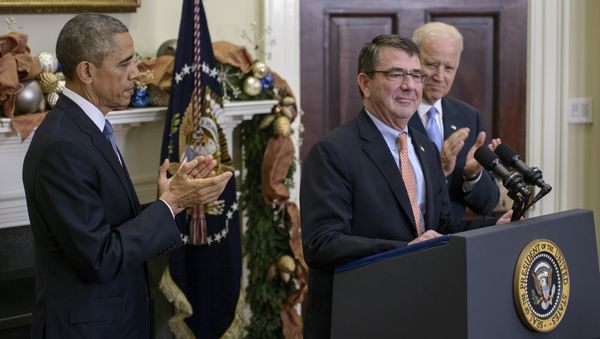 US President Barack Obama (L) and Vice President Joseph Biden (R) clap for Ashton Carter after nominating him for Secretary of Defense in the Roosevelt Room of the White House December 5, 2014 in Washington, DC - Sputnik International
