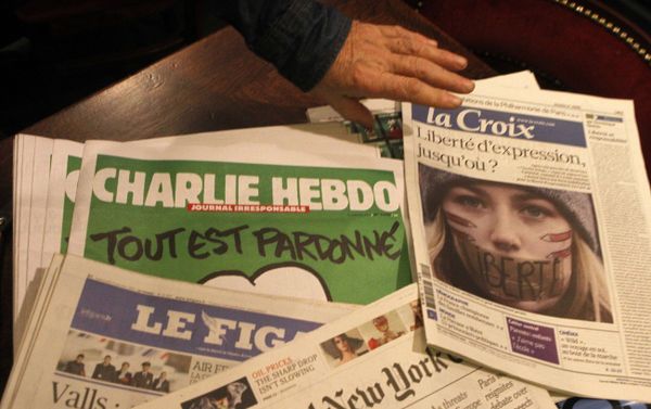 Copies of the latest issue of Charlie Hebdo newspaper are sold with other newspapers at a newsstand in Lille, northern France Copies of the latest issue of Charlie Hebdo newspaper are sold with other newspapers at a newsstand in Lille, northern France - Sputnik International