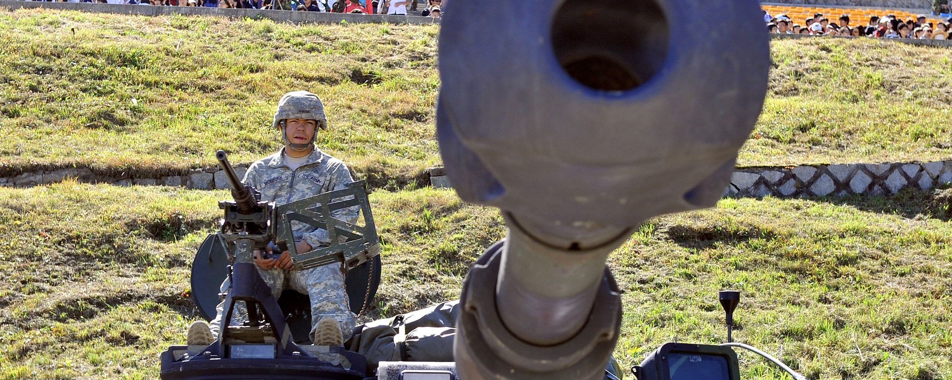 A US soldier sits on the top of M109A6 Paladin 155mm Howitzer during a joint military exercise on the Seungjin Fire Training Field in Pocheon, 30 kms south of the border with North Korea . File photo A US soldier sits on the top of M109A6 Paladin 155mm Howitzer during a joint military exercise on the Seungjin Fire Training Field in Pocheon, 30 kms south of the border with North Korea . File photo - Sputnik International, 1920, 27.04.2022