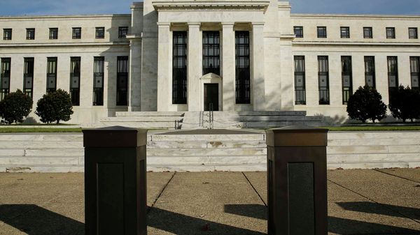 The United States Federal Reserve Board building is shown behind security barriers in Washington The United States Federal Reserve Board building is shown behind security barriers in Washington - Sputnik International
