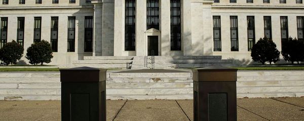 The United States Federal Reserve Board building is shown behind security barriers in Washington The United States Federal Reserve Board building is shown behind security barriers in Washington - Sputnik International
