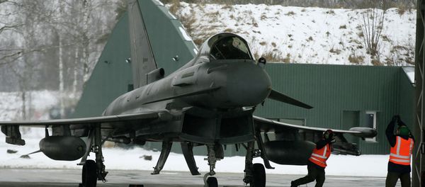 Italy's Eurofighter Typhoon jet fighter prepares for take off during NATO's Baltic Air Policing Mission at the Siauliai airbase some 240 kms (150 miles) east of the capital Vilnius, Lithuania, Thursday, Jan. 29, 2015 Italy's Eurofighter Typhoon jet fighter prepares for take off during NATO's Baltic Air Policing Mission at the Siauliai airbase some 240 kms (150 miles) east of the capital Vilnius, Lithuania, Thursday, Jan. 29, 2015 - Sputnik International