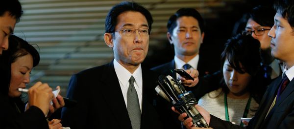 Japan's Foreign Minister Fumio Kishida listens to questions from reporters - Sputnik International