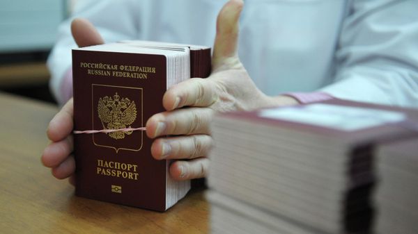 News conference on launch of biometric passports for Russian citizens - Sputnik International
