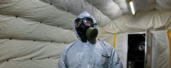 A marine officer of the Cape Ray, a ship equipped to neutralize Syrian chemicals, shows a chemical protection suit to reporters A marine officer of the Cape Ray, a ship equipped to neutralize Syrian chemicals, shows a chemical protection suit to reporters - Sputnik International