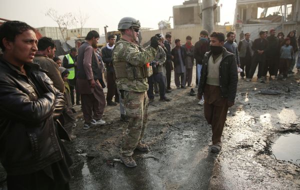 A US soldier at the site of a suicide car bomb attack in Kabul, Afghanistan. - Sputnik International