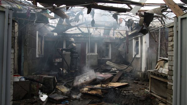 Consequences of artillery attack on Donetsk's Kuibyshevsky District Consequences of artillery attack on Donetsk's Kuibyshevsky District - Sputnik International