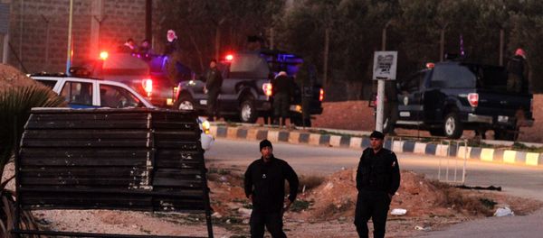Jordanian security stand guard outside Swaqa prison, after the executions of Sajida al-Rishawi and Ziad al-Karbouly, two Iraqis linked to al-Qaida, about 50 miles (80 kilometers) south of the Jordan's capital, Amman, Wednesday, Feb. 4, 2015. Jordanian security stand guard outside Swaqa prison, after the executions of Sajida al-Rishawi and Ziad al-Karbouly, two Iraqis linked to al-Qaida, about 50 miles (80 kilometers) south of the Jordan's capital, Amman, Wednesday, Feb. 4, 2015. - Sputnik International