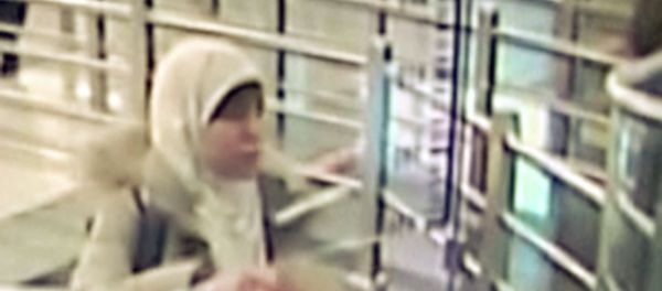 Hayat Boumeddiene, the suspected female accomplice of the Islamist militants behind the attacks in Paris, is seen upon her arrival to Turkey in this still image taken from surveillance video at Sabiha Gokcen airport in Istanbul on January 2, 2015. Hayat Boumeddiene, the suspected female accomplice of the Islamist militants behind the attacks in Paris, is seen upon her arrival to Turkey in this still image taken from surveillance video at Sabiha Gokcen airport in Istanbul on January 2, 2015. - Sputnik International