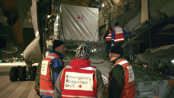 A mobile clinic of the Red Cross is being loaded onto a cargo plane in Tampere airport A mobile clinic of the Red Cross is being loaded onto a cargo plane in Tampere airport - Sputnik International