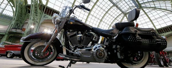 A Harley-Davidson motorcycle blessed with the signature of Emeritus Pope Benedict XVI, and later received by Pope Francis, is displayed ahead of the Bonhams' Les Grandes Marques du Monde vintage motor cars and motorcycles auction at the Grand Palais exhibition hall as part of the Retromobile vintage car show in Paris February 4, 2015 A Harley-Davidson motorcycle blessed with the signature of Emeritus Pope Benedict XVI, and later received by Pope Francis, is displayed ahead of the Bonhams' Les Grandes Marques du Monde vintage motor cars and motorcycles auction at the Grand Palais exhibition hall as part of the Retromobile vintage car show in Paris February 4, 2015 - Sputnik International