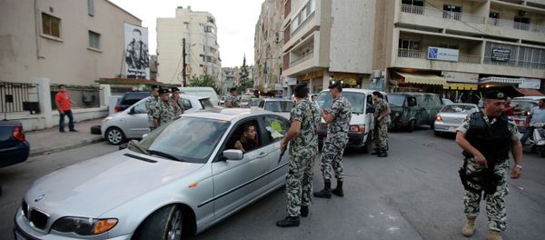 Lebanese security forces man a checkpoint in the southern suburb of the capital Beirut Lebanese security forces man a checkpoint in the southern suburb of the capital Beirut - Sputnik International