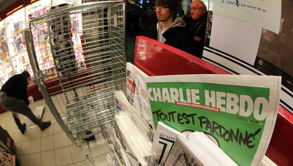 The latest issue of Charlie Hebdo newspaper at a newsstand The latest issue of Charlie Hebdo newspaper at a newsstand - Sputnik International