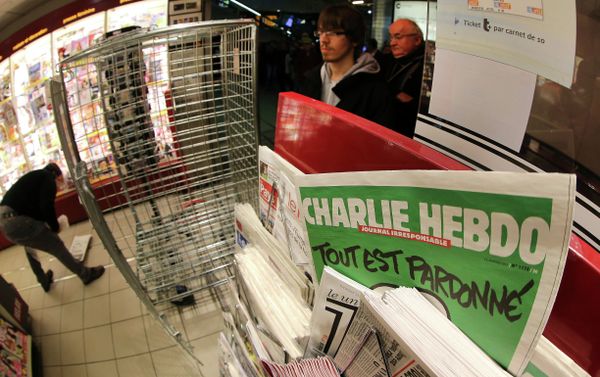 the latest issue of Charlie Hebdo newspaper at a newsstand the latest issue of Charlie Hebdo newspaper at a newsstand - Sputnik International