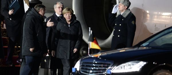 German Chancellor Merkel, French President Hollande arrive in Moscow German Chancellor Merkel, French President Hollande arrive in Moscow - Sputnik International