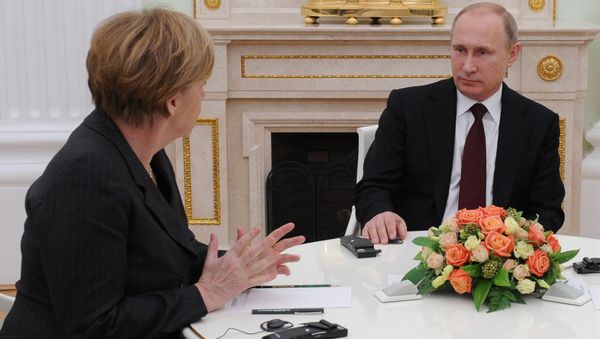 Russian President Vladimir Putin holds meeting with FRG Chancellor Angela Merkel and President of France Francois Hollande Russian President Vladimir Putin holds meeting with FRG Chancellor Angela Merkel and President of France Francois Hollande - Sputnik International