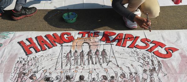 An Indian artist works on a banner condemning rape in New Delhi on December 16, 2014 An Indian artist works on a banner condemning rape in New Delhi on December 16, 2014 - Sputnik International